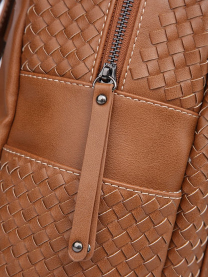 Monedero tipo mochila tejido en marrón